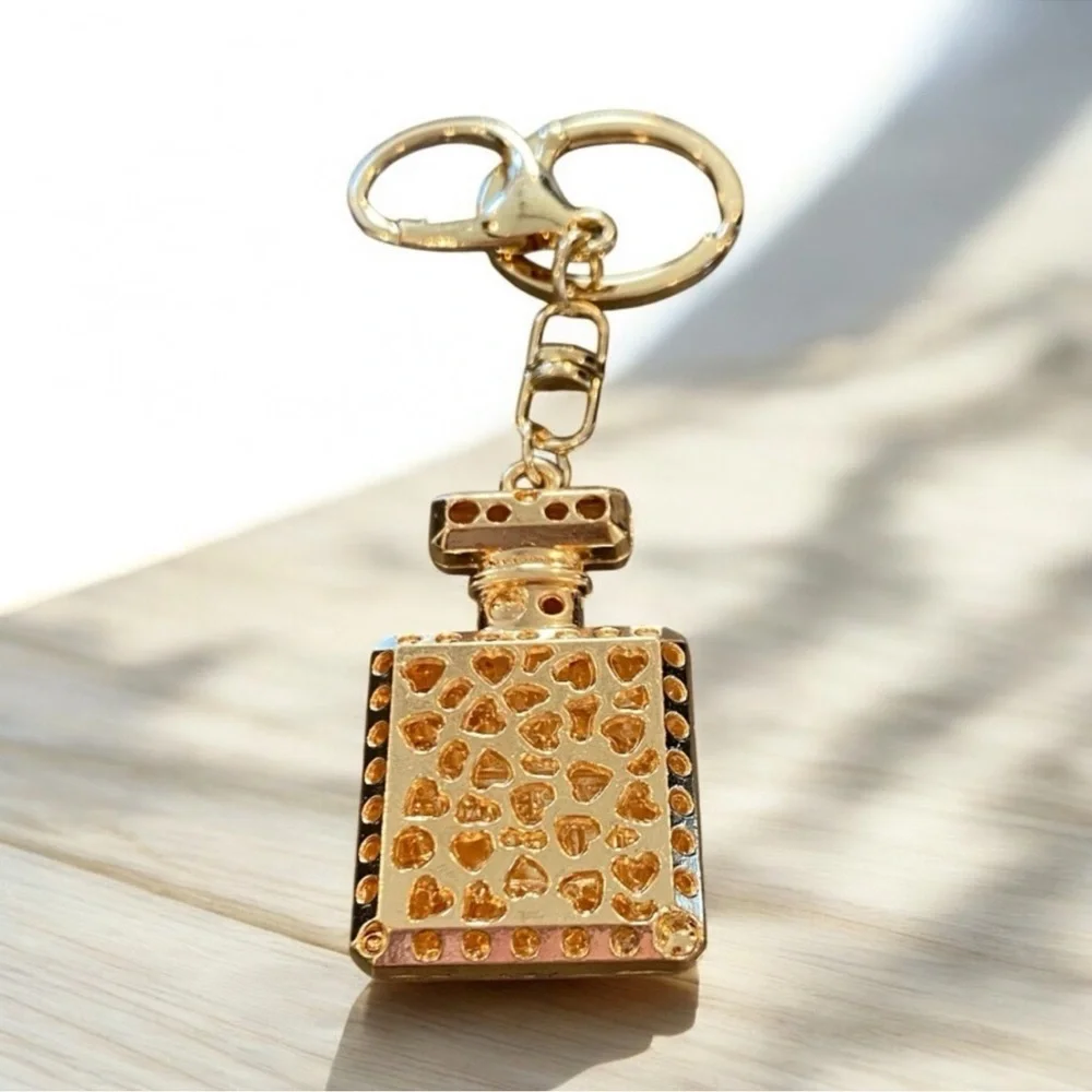 Elegant Rainbow crystal adorned Parfum bottle Goldtone keychain - Picture 4 of 7